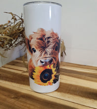 Load image into Gallery viewer, Tumbler with a cow and sunflower design on a white background