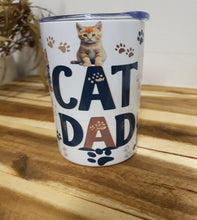 Load image into Gallery viewer, Tumbler with 'Cat Dad' text and a cat illustration on a wooden surface