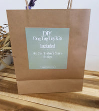 Load image into Gallery viewer, Brown paper bag with a green label on a white background