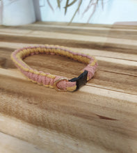 Load image into Gallery viewer, Collar with pink and yellow pattern on a wooden surface