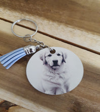 Load image into Gallery viewer, Keychain with tassel on a wooden surface