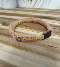 Load image into Gallery viewer, Collar with pink and yellow pattern on a wooden surface