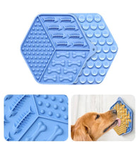 Load image into Gallery viewer, Blue silicone mat with textured design and a dog interacting with it.
