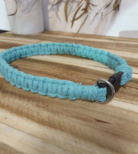 Load image into Gallery viewer, Teal braided dog collar with a black clip on a wooden surface
