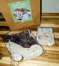 Load image into Gallery viewer, DIY Christmas gnomes and ornament kit with yarn on a wooden surface
