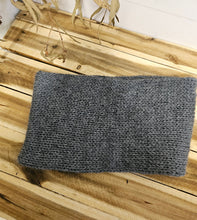 Load image into Gallery viewer, Gray knitted Neck Warmer on a wooden surface
