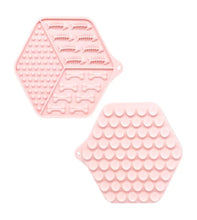 Load image into Gallery viewer, Two pink silicone mats with textured patterns on a white background
