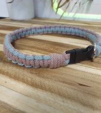 Load image into Gallery viewer, Pink and blue braided collar with a black clip on a wooden surface
