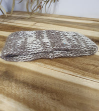 Load image into Gallery viewer, Knitted gray and white sock on a wooden surface

