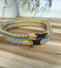 Load image into Gallery viewer, Collars with black clasp on a wooden surface
