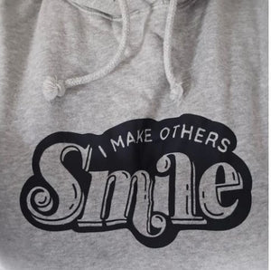 Customised jumper- text in blue "I make others Smile"