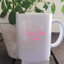 Load image into Gallery viewer, White mug with where text can be desplayed on a wood background
